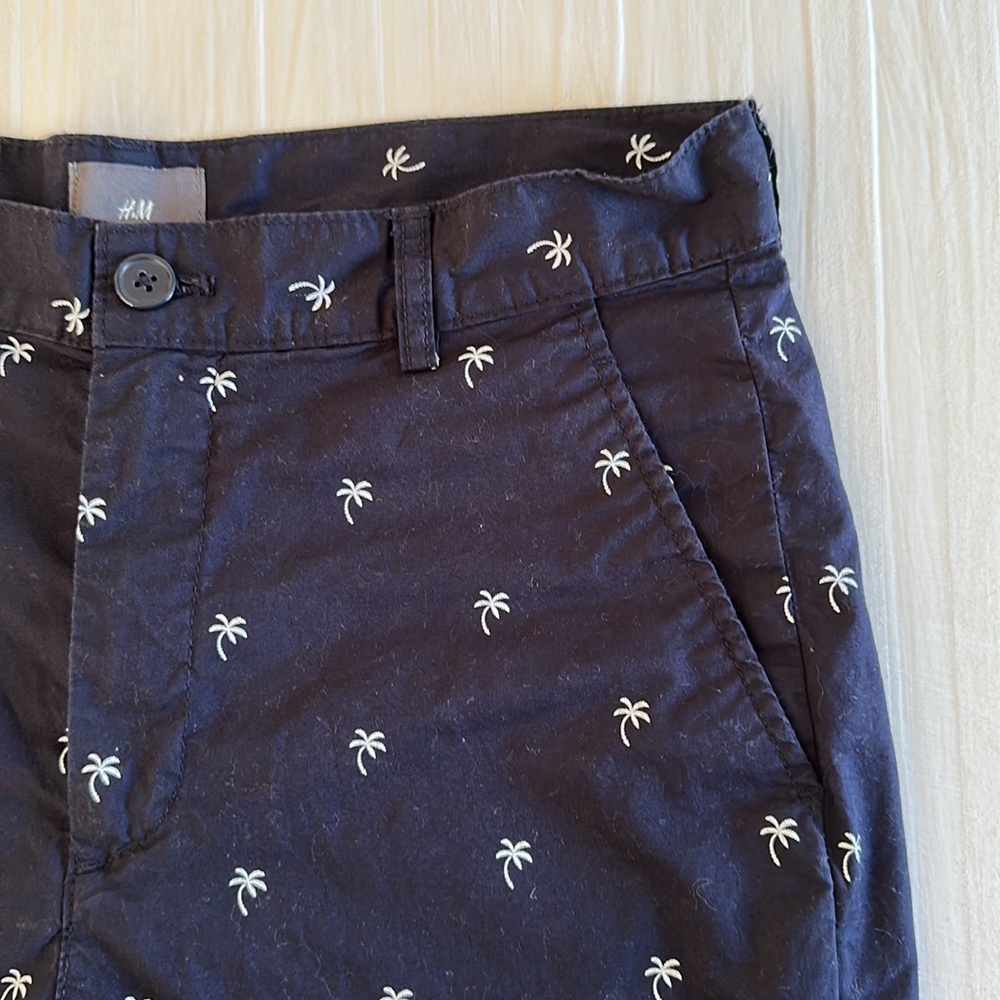 H&M men’s chino shorts. Navy with palm tree motif